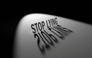3D illustration with the phrase “Stop Lying” in bold ITC Benguiat font, symbolizing the prohibition of lying in Islam and the importance of truthfulness